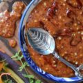Sweet & Spicy Red Chili Garlic Sauce - This sweet and spicy homemade condiment, made with red chili peppers and a healthy amount of garlic, can be used to make just about any food more flavorful. It's really up to you how to use this sauce. You can use it to baste grilled seafood, marinate steak, or even to enhance the flavor of your favorite salad dressing or dip.
