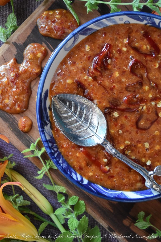 Sweet & Spicy Red Chili Garlic Sauce - This sweet and spicy homemade condiment, made with red chili peppers and a healthy amount of garlic, can be used to make just about any food more flavorful. It's really up to you how to use this sauce. You can use it to baste grilled seafood, marinate steak, or even to enhance the flavor of your favorite salad dressing or dip.