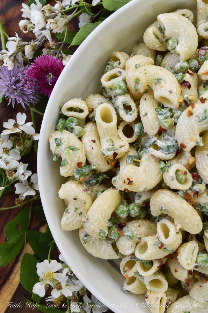 Green Pea & Herb Macaroni Salad - This herb-packed macaroni salad uses frozen sweet baby peas for extra nutrition and taste. I just love it when a pasta salad utilizes vegetables, not only for flavor but also as an added health benefit, don't you? Serving this side salad is definitely a great way to get your kids to eat their veggies.