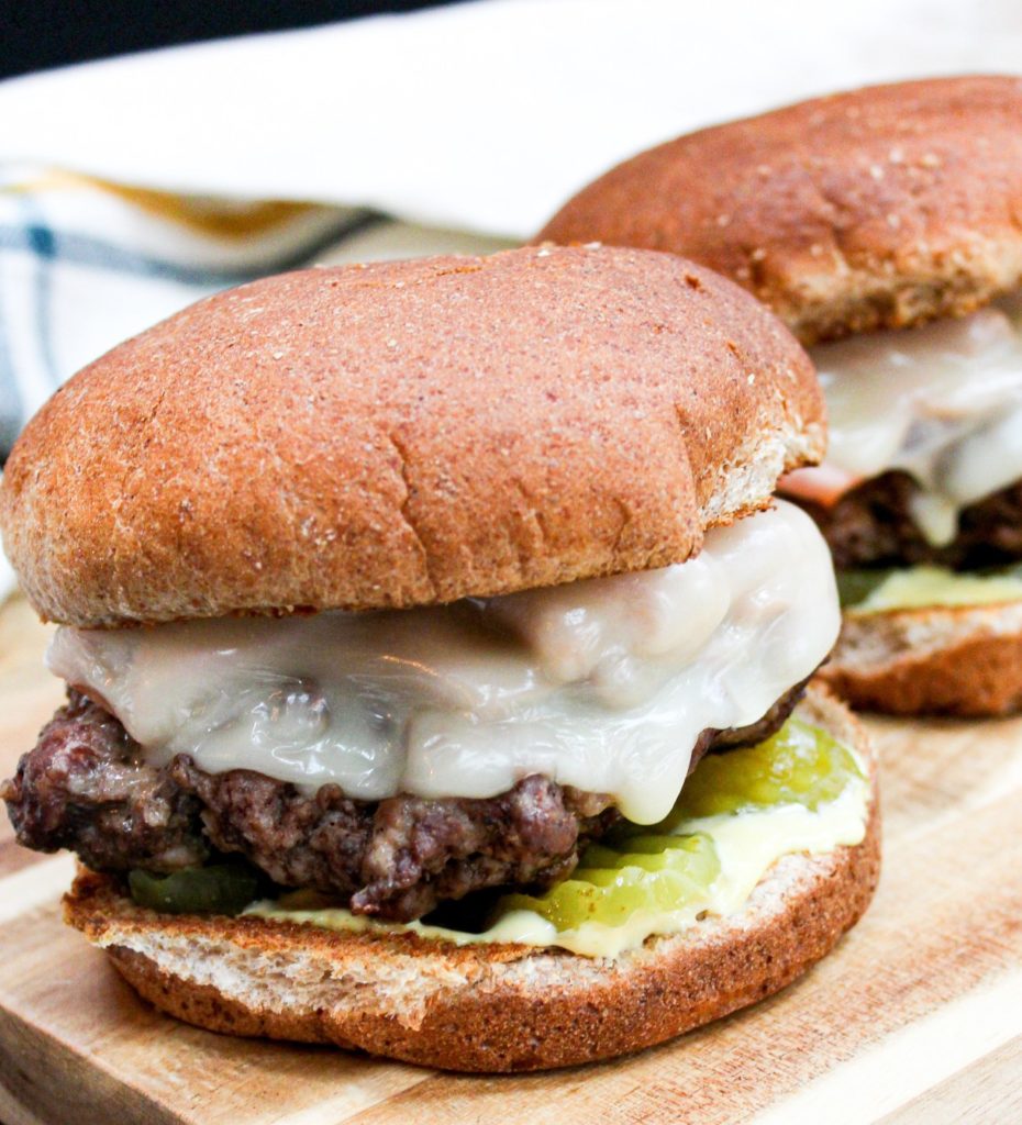 Cuban Sandwich Burger - Cheese Curd in Paradise - July 2019 Recipe Round-Up - The Fourth of July is always an excellent day to fire up the grill and invite over some friends and family to observe the national holiday. This month we're sharing all of our favorite summer recipes to help you plan your picnic, cookout, or barbecue, including a few red, white, and blue patriotic ones, which are just perfect for celebrating July 4th.