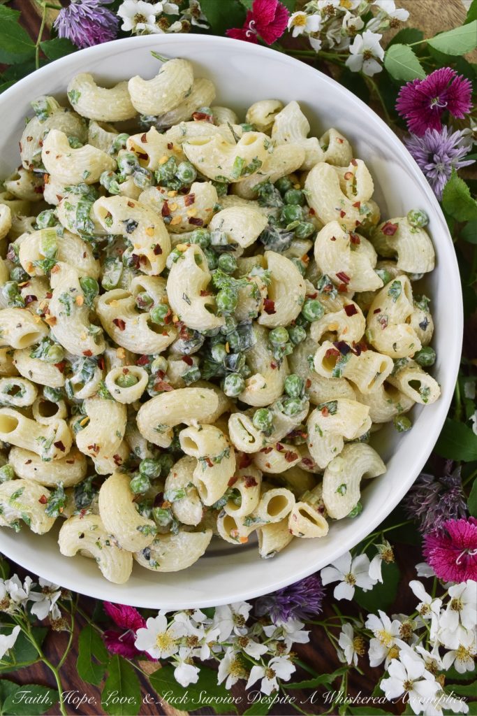 Green Pea & Herb Macaroni Salad - This herb-packed macaroni salad uses frozen sweet baby peas for extra nutrition and taste. I just love it when a pasta salad utilizes vegetables, not only for flavor but also as an added health benefit, don't you? Serving this side salad is definitely a great way to get your kids to eat their veggies.
