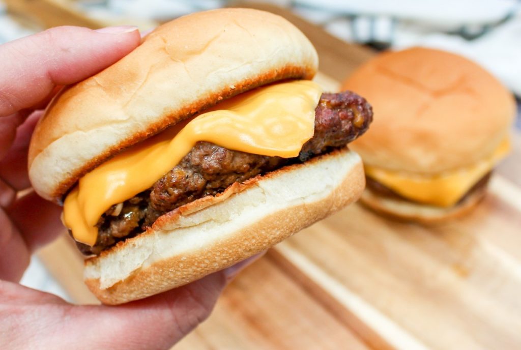 Grilled Chili Cheeseburger - Cheese Curd in Paradise - July 2019 Recipe Round-Up - The Fourth of July is always an excellent day to fire up the grill and invite over some friends and family to observe the national holiday. This month we're sharing all of our favorite summer recipes to help you plan your picnic, cookout, or barbecue, including a few red, white, and blue patriotic ones, which are just perfect for celebrating July 4th.
