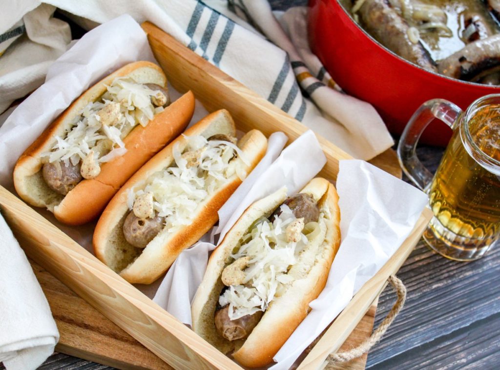 Wisconsin Beer Brats - Cheese Curd in Paradise - July 2019 Recipe Round-Up - The Fourth of July is always an excellent day to fire up the grill and invite over some friends and family to observe the national holiday. This month we're sharing all of our favorite summer recipes to help you plan your picnic, cookout, or barbecue, including a few red, white, and blue patriotic ones, which are just perfect for celebrating July 4th.