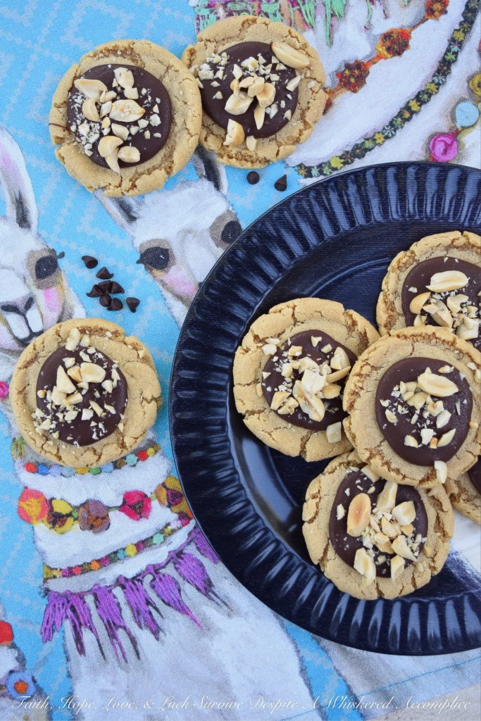 Classic Peanut Butter Chocolate-Filled Cookies - One of the most classic food combinations imaginable is peanut butter and chocolate. Perhaps that's why these peanut butter chocolate-filled cookies are so hard to resist. And thankfully, these sweet cookies are super easy to make, because this is the type of cookie recipe your family will ask you to make for them over and over again.