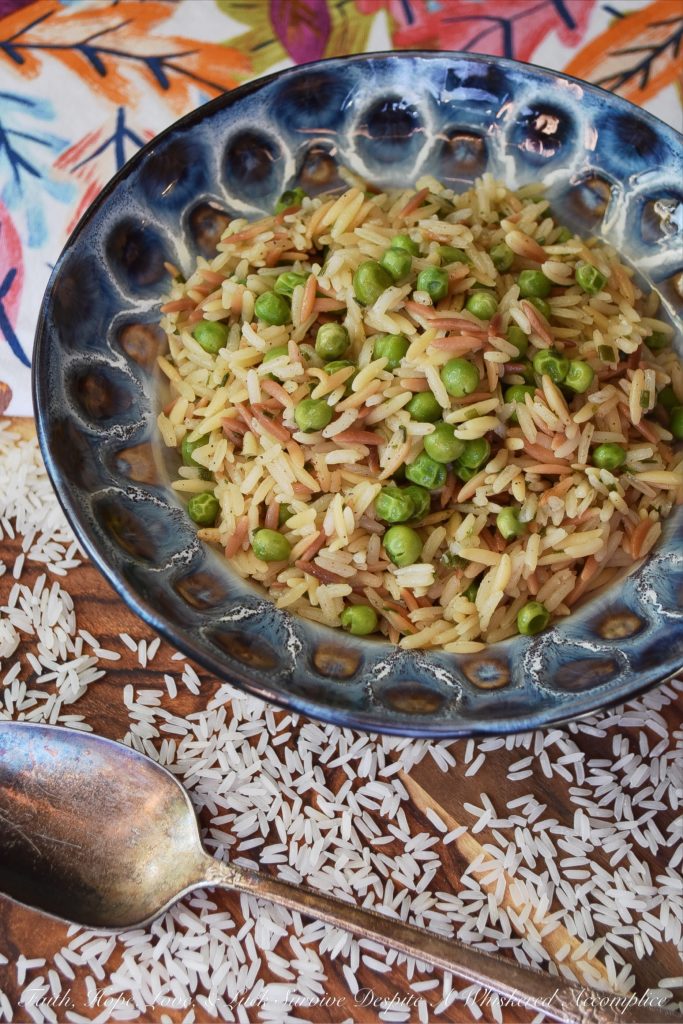 Weeknight Rice Pilaf with Peas & Chives - This delicious side dish is the perfect accompaniment to just about any busy weeknight meal. It takes less than 30 minutes to make, only requires a few minutes of stirring, and can be made using one pot or one pan. And since it also contains frozen peas, it will save you from having to make an additional vegetable side dish.