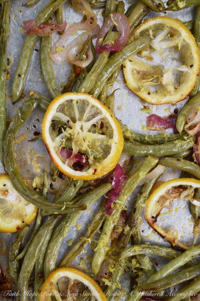 Lemony Summer Roasted Green Beans - It doesn't take much to make fresh summer green beans taste absolutely amazing. Roasting them is definitely the way to go. Topping them with a thinly sliced lemon while they are roasting and the zest and juice of yet another lemon after they are roasted helps to add lots of bright, tangy, and delicious lemony flavor.