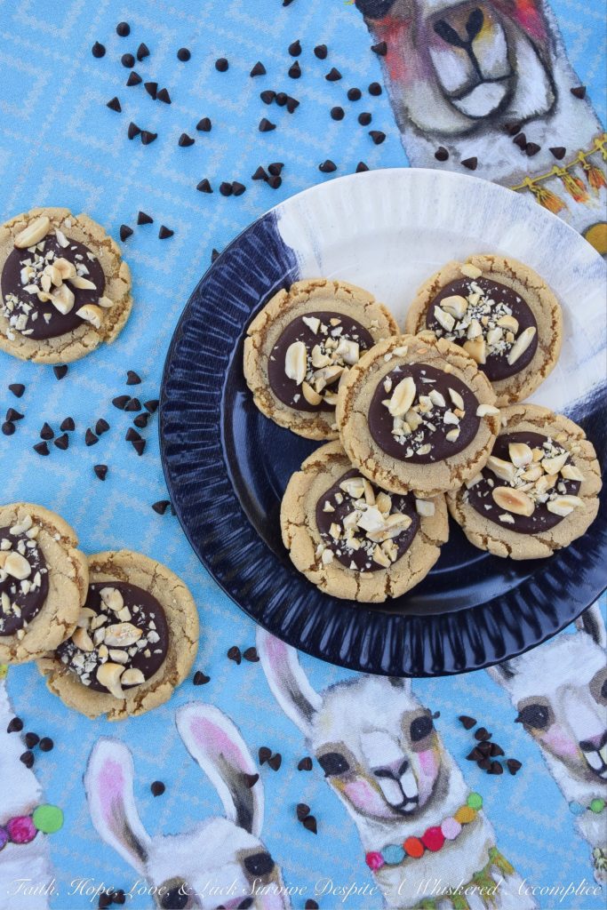 Classic Peanut Butter Chocolate-Filled Cookies - One of the most classic food combinations imaginable is peanut butter and chocolate. Perhaps that's why these peanut butter chocolate-filled cookies are so hard to resist. And thankfully, these sweet cookies are super easy to make, because this is the type of cookie recipe your family will ask you to make for them over and over again.
