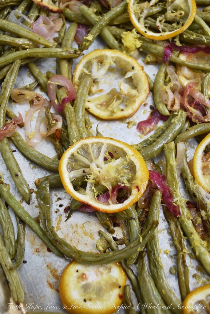 Lemony Summer Roasted Green Beans - It doesn't take much to make fresh summer green beans taste absolutely amazing. Roasting them is definitely the way to go. Topping them with a thinly sliced lemon while they are roasting and the zest and juice of yet another lemon after they are roasted helps to add lots of bright, tangy, and delicious lemony flavor.