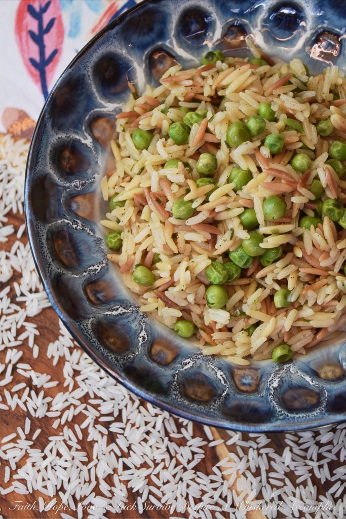 Weeknight Rice Pilaf with Peas & Chives - This delicious side dish is the perfect accompaniment to just about any busy weeknight meal. It takes less than 30 minutes to make, only requires a few minutes of stirring, and can be made using one pot or one pan. And since it also contains frozen peas, it will save you from having to make an additional vegetable side dish.