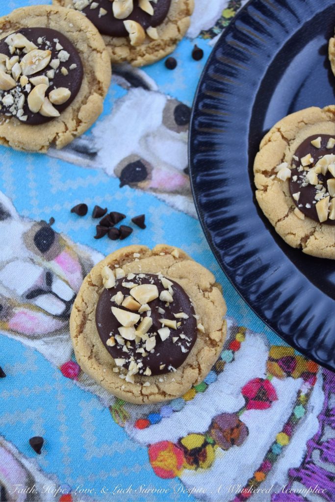 Classic Peanut Butter Chocolate-Filled Cookies - One of the most classic food combinations imaginable is peanut butter and chocolate. Perhaps that's why these peanut butter chocolate-filled cookies are so hard to resist. And thankfully, these sweet cookies are super easy to make, because this is the type of cookie recipe your family will ask you to make for them over and over again.