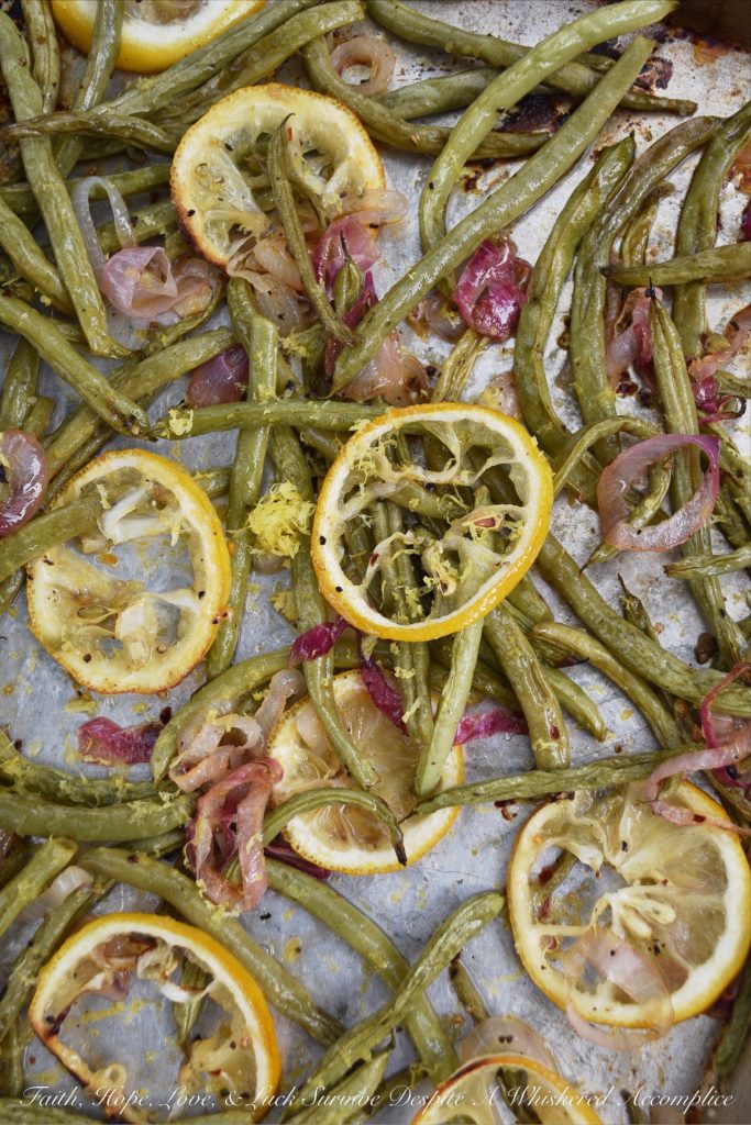 Lemony Summer Roasted Green Beans - It doesn't take much to make fresh summer green beans taste absolutely amazing. Roasting them is definitely the way to go. Topping them with a thinly sliced lemon while they are roasting and the zest and juice of yet another lemon after they are roasted helps to add lots of bright, tangy, and delicious lemony flavor.