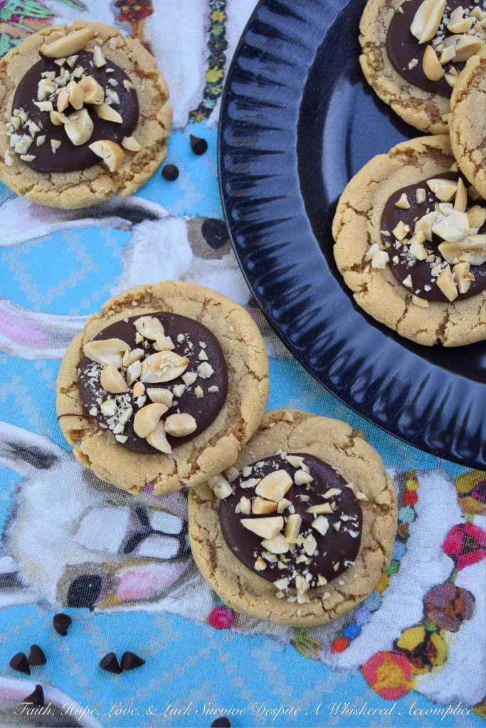 Classic Peanut Butter Chocolate-Filled Cookies - One of the most classic food combinations imaginable is peanut butter and chocolate. Perhaps that's why these peanut butter chocolate-filled cookies are so hard to resist. And thankfully, these sweet cookies are super easy to make, because this is the type of cookie recipe your family will ask you to make for them over and over again.