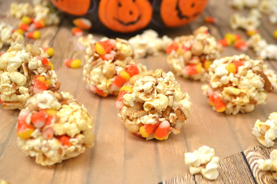 Candy Corn Popcorn Balls - Crafty Cooking Mama - October 2019 Recipe Round-Up - Now that it's fall and Halloween's right around the corner, we're all looking for a few cute recipes to celebrate the autumn season with. This month's October recipe round-up is packed with tons of spooky sweet and savory recipes to help you and your little goblins get in the holiday spirit.