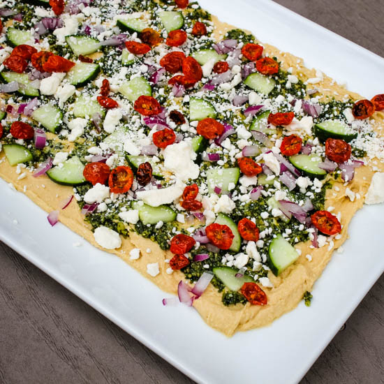 Mediterranean Layer Dip - Books n' Cooks - Welcome to Friday! Friday! Friday! Favorites! Each Friday we'll be sharing our favorite recipes of the week from other fabulous food bloggers, so make sure to visit and see what tasty over-the-top dishes we're most excited about.