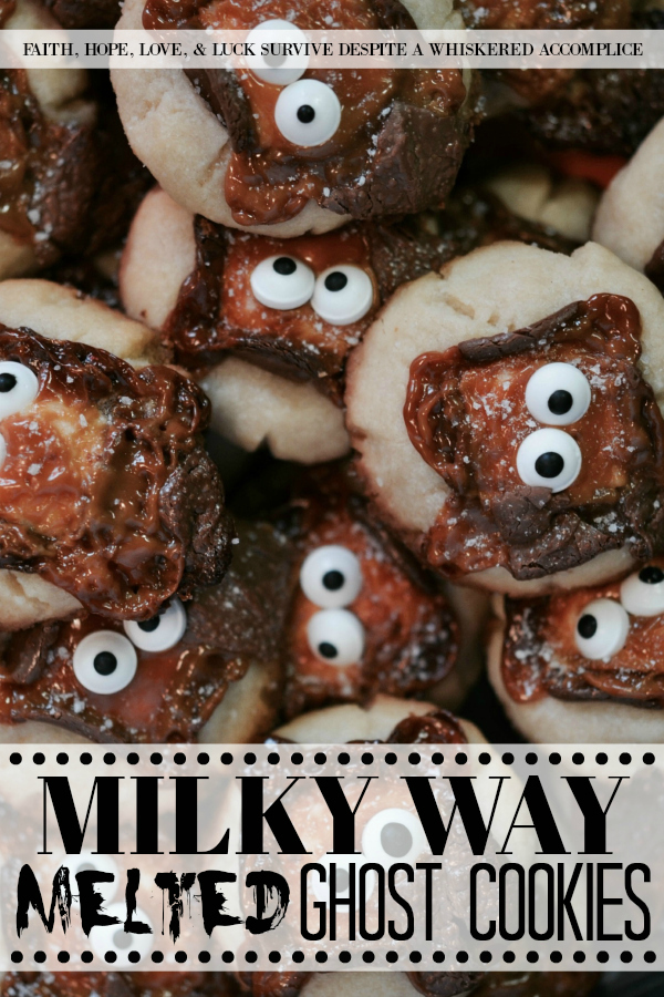 Milky Way Melted Ghost Cookies - These adorable Halloween cookies are so extremely festive, yet so easy to make. Simply place a mini Milky Way candy bar on top of each cookie before baking and then decorate with candy eyes and a light sprinkle of sea salt after taking out of the oven. How simple is that? These cookies are such a fun, festive, and adorably spooky holiday treat.