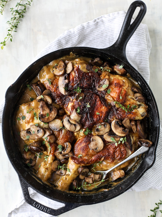 Smothered Skillet Chicken with Thyme Butter Mushrooms - How Sweet Eats - Welcome to Friday! Friday! Friday! Favorites! Each Friday we'll be sharing our favorite recipes of the week from other fabulous food bloggers, so make sure to visit and see what tasty over-the-top dishes we're most excited about.
