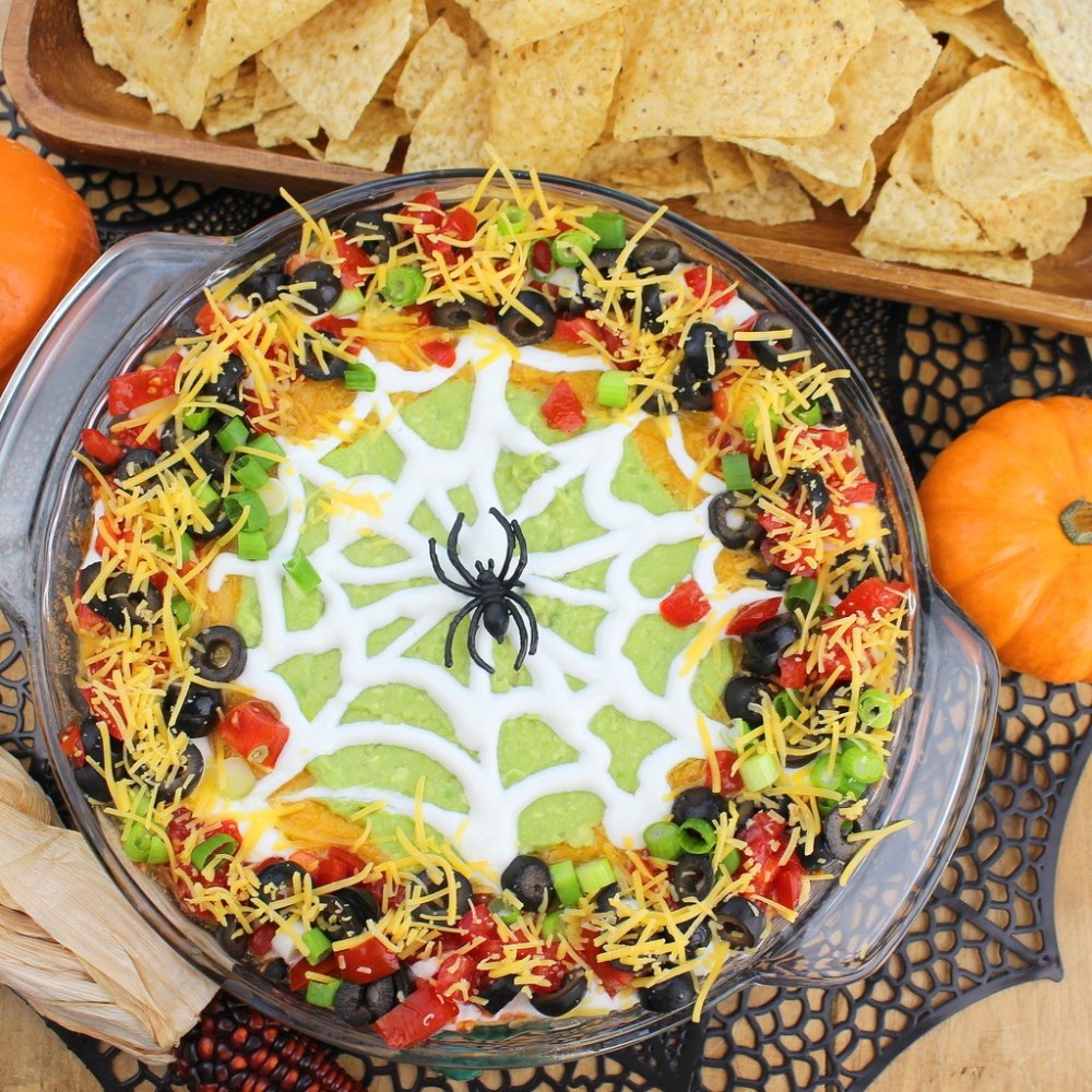 Spider Web Taco Dip - The Palatable Pastime - October 2019 Recipe Round-Up - Now that it's fall and Halloween's right around the corner, we're all looking for a few cute recipes to celebrate the autumn season with. This month's October recipe round-up is packed with tons of spooky sweet and savory recipes to help you and your little goblins get in the holiday spirit.