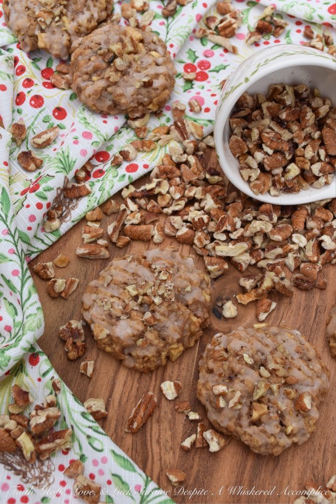 Soft Cinnamon Apple Pecan Cookies - Every holiday cookie platter needs a nutty cookie to make it complete. This apple and pecan cinnamon iced cookie is that cookie. If you like soft, sweet, crunchy, fruity, cinnamon packed Christmas cookies, this is one recipe you're absolutely going to love.
