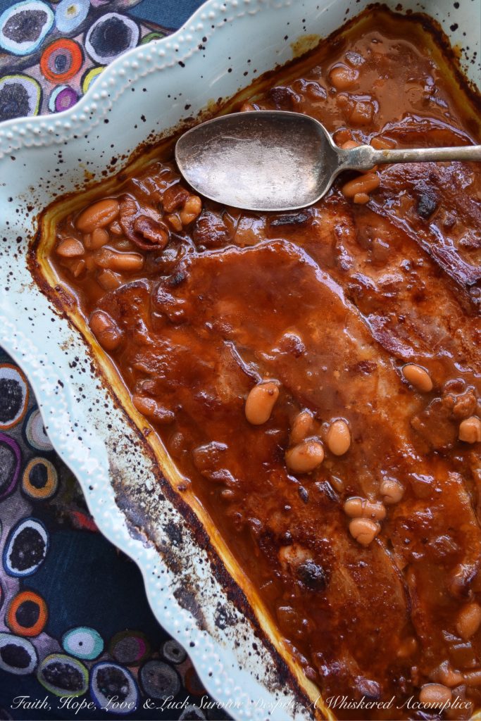 Baked Barbecued Beans with Bacon - Are you ready to enjoy the best baked beans you've ever tasted? These barbecued beans, made using canned great northern beans, will simply knock your socks off. Yes, they're just that good. It must have something to do with the bacon, diced onion, molasses, brown sugar, ketchup, and seasonings used to make them. You'll never buy canned baked beans again.