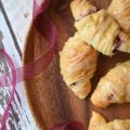 Cranberry Crescent Rolls with Maple Icing - A little leftover cranberry sauce goes a long way when used in these light and airy cranberry crescent rolls drizzled with maple icing. So this Thanksgiving, make sure you have enough cranberry sauce to make these for breakfast. They're the perfect way to start off the holiday and you'll love how fast, simple, and delicious they are.