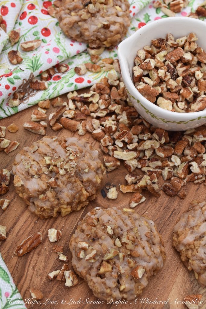 Soft Cinnamon Apple Pecan Cookies - Every holiday cookie platter needs a nutty cookie to make it complete. This apple and pecan cinnamon iced cookie is that cookie. If you like soft, sweet, crunchy, fruity, cinnamon packed Christmas cookies, this is one recipe you're absolutely going to love.