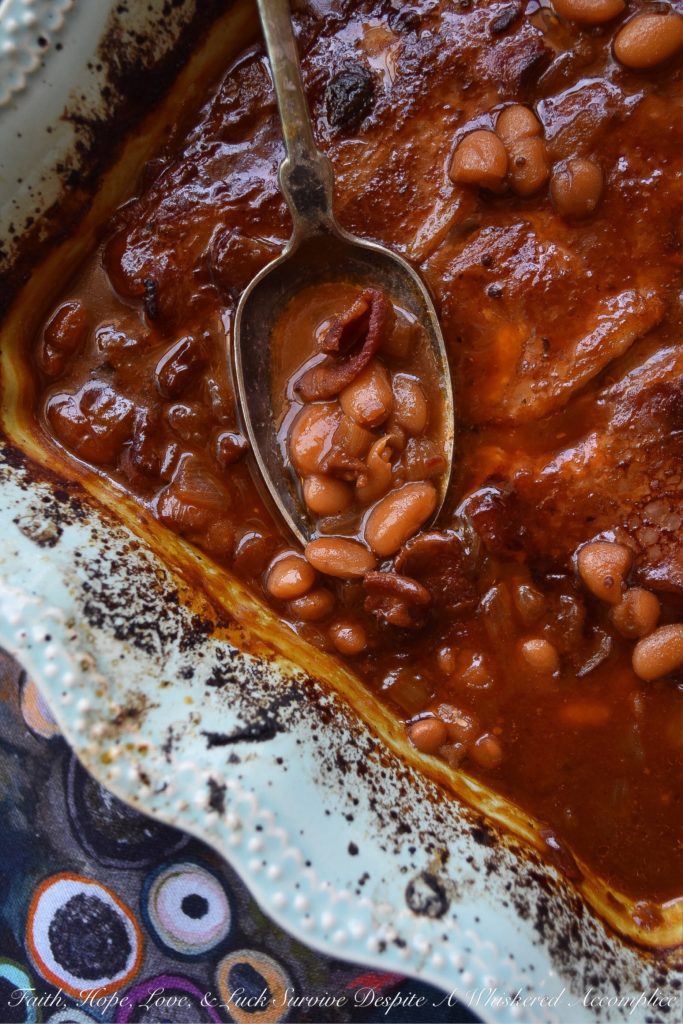 Baked Barbecued Beans with Bacon - Are you ready to enjoy the best baked beans you've ever tasted? These barbecued beans, made using canned great northern beans, will simply knock your socks off. Yes, they're just that good. It must have something to do with the bacon, diced onion, molasses, brown sugar, ketchup, and seasonings used to make them. You'll never buy canned baked beans again.
