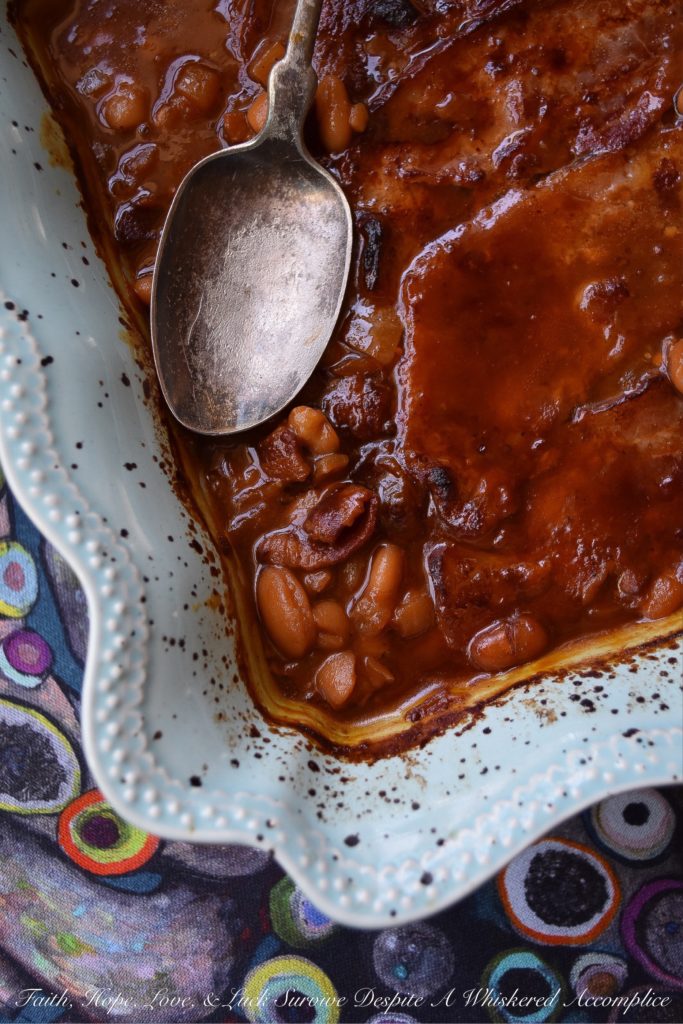 Baked Barbecued Beans with Bacon - Are you ready to enjoy the best baked beans you've ever tasted? These barbecued beans, made using canned great northern beans, will simply knock your socks off. Yes, they're just that good. It must have something to do with the bacon, diced onion, molasses, brown sugar, ketchup, and seasonings used to make them. You'll never buy canned baked beans again.