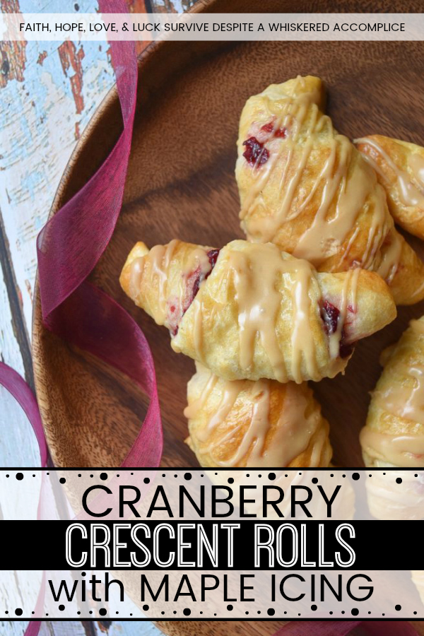Cranberry Crescent Rolls with Maple Icing - A little leftover cranberry sauce goes a long way when used in these light and airy cranberry crescent rolls drizzled with maple icing. So this Thanksgiving, make sure you have enough cranberry sauce to make these for breakfast. They're the perfect way to start off the holiday and you'll love how fast, simple, and delicious they are.