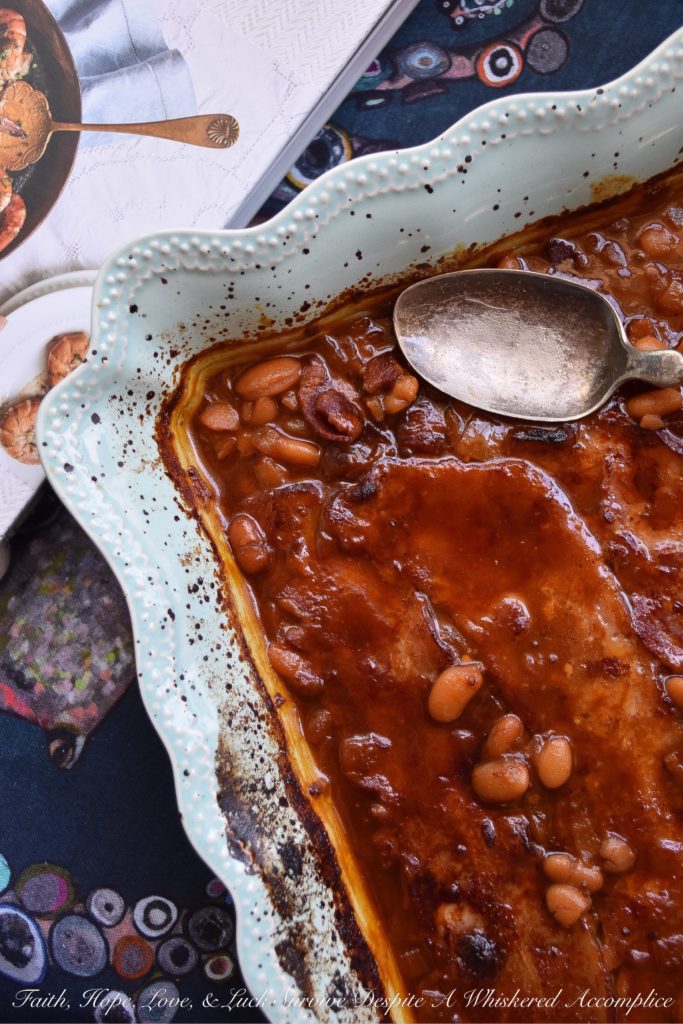 Baked Barbecued Beans with Bacon - Are you ready to enjoy the best baked beans you've ever tasted? These barbecued beans, made using canned great northern beans, will simply knock your socks off. Yes, they're just that good. It must have something to do with the bacon, diced onion, molasses, brown sugar, ketchup, and seasonings used to make them. You'll never buy canned baked beans again.
