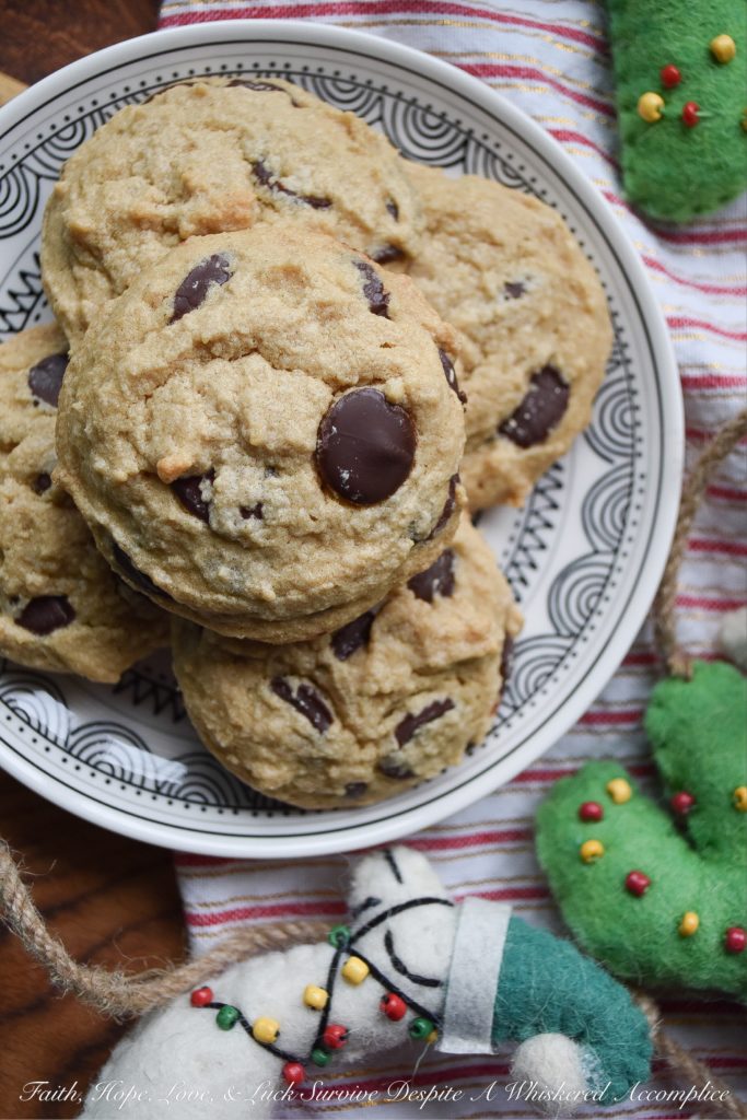 Crumbly Gluten-Free Chocolate Chip Cookies - Two ingredients give these gluten-free chocolate chip cookies their amazing crumbly texture; peanut butter and corn starch. And thanks to the healthy dose of chocolate chips in these crumbly cookies, I can pretty much promise, that once you have one, you're definitely going to want another. So, grab a glass of milk and a cookie or two, it's time to enjoy this sweet gluten-free treat.
