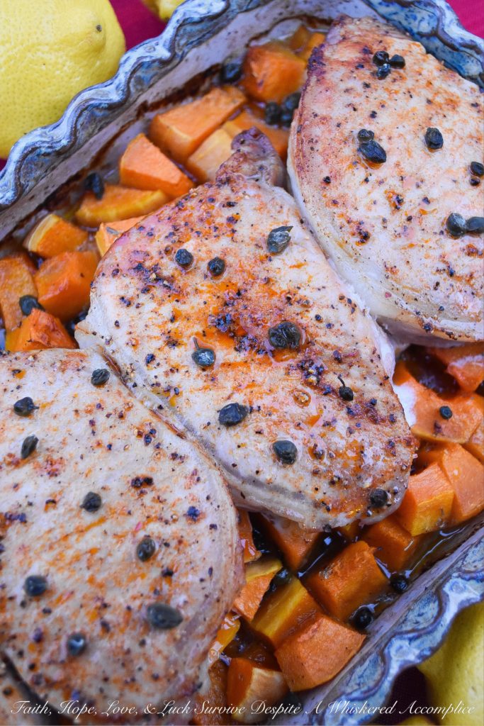 Pork Chops with Lemon Caper Butternut Squash - This one-pan meal is sure to be a hit with your family. The butternut squash is mixed with a lemon caper butter sauce and then lightly roasted before being topped with seasoned thick-cut pork chops and then cooked to perfection. Add some rice, pasta, or salad to this oven-baked dish, and you have the perfect weeknight meal.