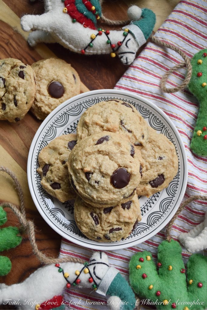 Crumbly Gluten-Free Chocolate Chip Cookies - Two ingredients give these gluten-free chocolate chip cookies their amazing crumbly texture; peanut butter and corn starch. And thanks to the healthy dose of chocolate chips in these crumbly cookies, I can pretty much promise, that once you have one, you're definitely going to want another. So, grab a glass of milk and a cookie or two, it's time to enjoy this sweet gluten-free treat.