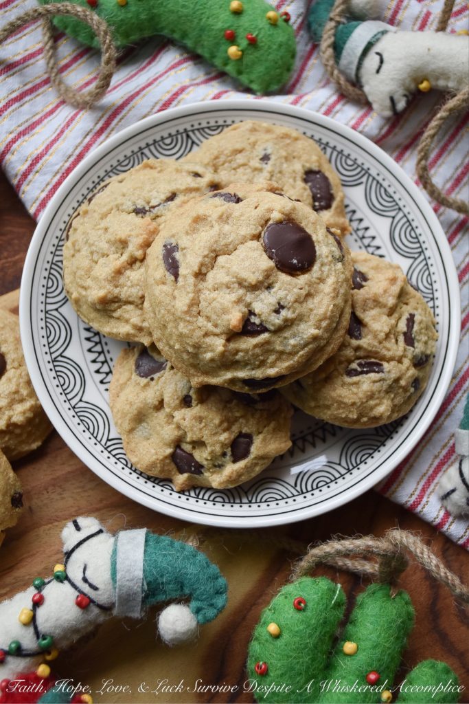 Crumbly Gluten-Free Chocolate Chip Cookies - Two ingredients give these gluten-free chocolate chip cookies their amazing crumbly texture; peanut butter and corn starch. And thanks to the healthy dose of chocolate chips in these crumbly cookies, I can pretty much promise, that once you have one, you're definitely going to want another. So, grab a glass of milk and a cookie or two, it's time to enjoy this sweet gluten-free treat.