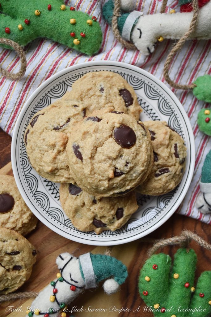 Crumbly Gluten-Free Chocolate Chip Cookies - Two ingredients give these gluten-free chocolate chip cookies their amazing crumbly texture; peanut butter and corn starch. And thanks to the healthy dose of chocolate chips in these crumbly cookies, I can pretty much promise, that once you have one, you're definitely going to want another. So, grab a glass of milk and a cookie or two, it's time to enjoy this sweet gluten-free treat.