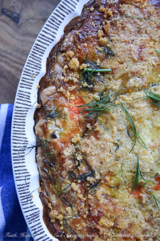 Cracker Crumb Topped Fennel & Carrot Quiche - From a sun-drenched weekend brunch to a quick, satisfying lunch, or even a cozy weeknight dinner, this veggie-loaded quiche effortlessly adapts to your needs. Imagine a golden, savory pie crust filled with the subtle anise notes of flavorful fennel, bright, sweet carrots, and the nutty, creamy tang of melted Gouda cheese, all crowned with an irresistible, crispy cracker crumb topping. Be prepared, this is one quiche recipe that will have your entire family begging for seconds.