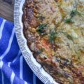 Cracker Crumb Topped Fennel & Carrot Quiche - From a sun-drenched weekend brunch to a quick, satisfying lunch, or even a cozy weeknight dinner, this veggie-loaded quiche effortlessly adapts to your needs. Imagine a golden, savory pie crust filled with the subtle anise notes of flavorful fennel, bright, sweet carrots, and the nutty, creamy tang of melted Gouda cheese, all crowned with an irresistible, crispy cracker crumb topping. Be prepared, this is one quiche recipe that will have your entire family begging for seconds.