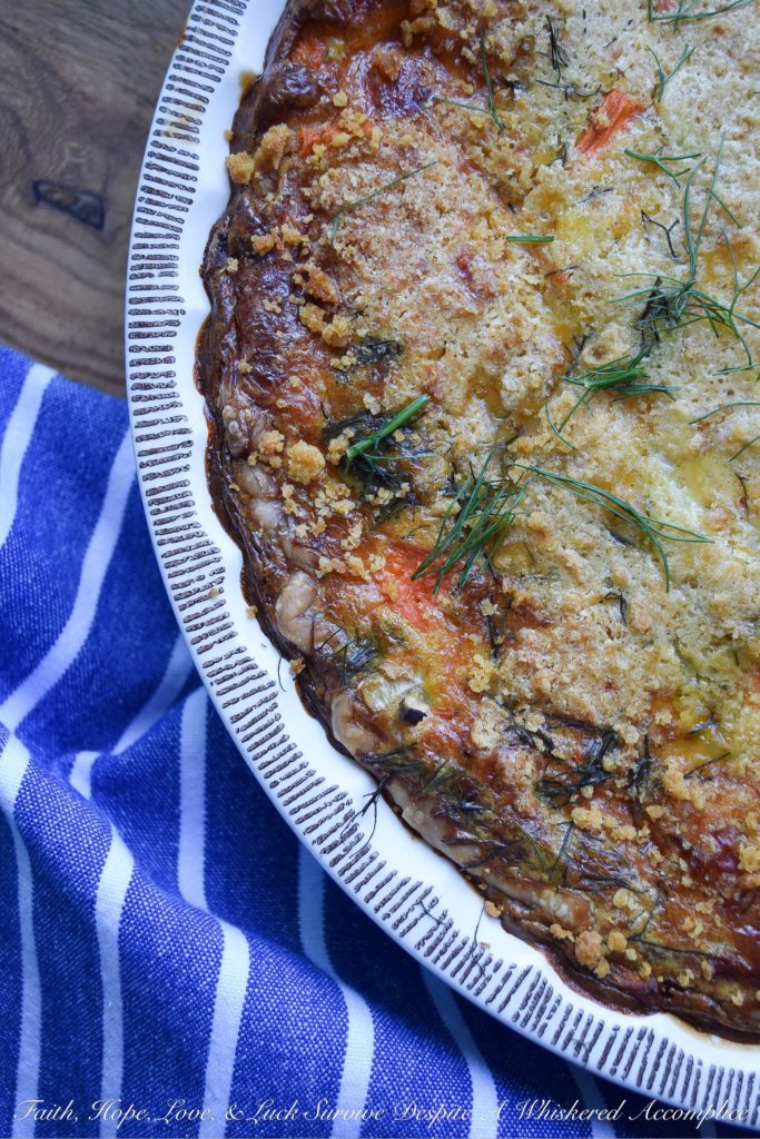Cracker Crumb Topped Fennel & Carrot Quiche - From a sun-drenched weekend brunch to a quick, satisfying lunch, or even a cozy weeknight dinner, this veggie-loaded quiche effortlessly adapts to your needs. Imagine a golden, savory pie crust filled with the subtle anise notes of flavorful fennel, bright, sweet carrots, and the nutty, creamy tang of melted Gouda cheese, all crowned with an irresistible, crispy cracker crumb topping. Be prepared, this is one quiche recipe that will have your entire family begging for seconds.