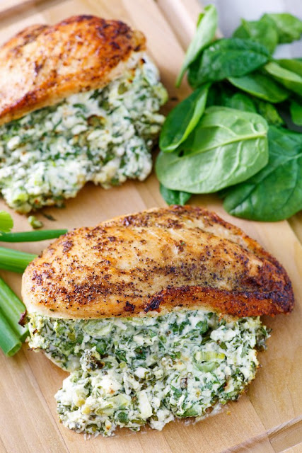 Jenna's Feta and Spinach Stuffed Chicken Breasts - Cooking with Carlee - Welcome to Friday! Friday! Friday! Favorites! Each Friday we'll be sharing our favorite recipes of the week from other fabulous food bloggers, so make sure to visit and see what tasty over-the-top dishes we're most excited about.