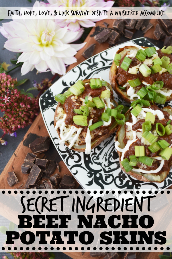 Secret Ingredient Beef Nacho Potato Skins - There's a secret ingredient used in these potato skins which helps make them taste absolutely amazing. Can you guess what it is? Chocolate. Adding a little bit of bittersweet baking chocolate to the nacho beef mixture stuffed inside of these oven-baked potato skins truly does make all the difference. Don't believe me? Give them a try and see for yourself.