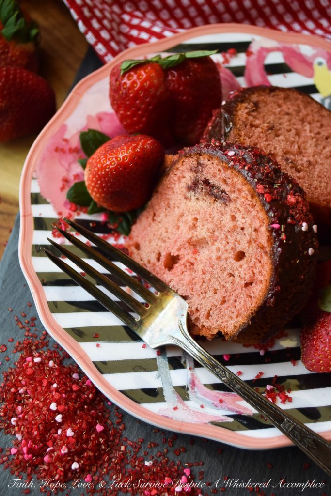 Chocolate-Glazed Extreme Strawberry Bundt Cake - Don't be afraid to reach for a boxed cake mix the next time you visit your local market or grocery store. With the addition of freeze-dried strawberry slices and a few other extra ingredients, this chocolate-glazed strawberry Bundt cake will have everyone who tastes it falling instantly head-over-heels in love. And, as an added bonus, it's as gorgeous as it is delicious.