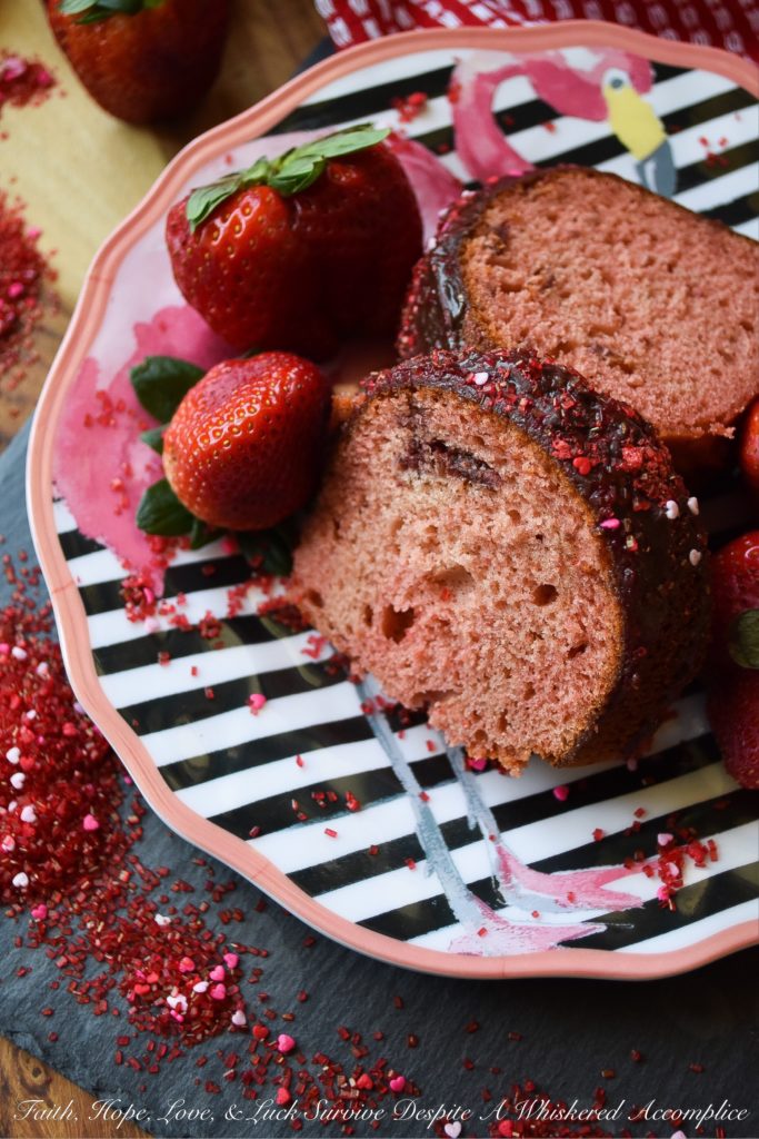 Chocolate-Glazed Extreme Strawberry Bundt Cake - Don't be afraid to reach for a boxed cake mix the next time you visit your local market or grocery store. With the addition of freeze-dried strawberry slices and a few other extra ingredients, this chocolate-glazed strawberry Bundt cake will have everyone who tastes it falling instantly head-over-heels in love. And, as an added bonus, it's as gorgeous as it is delicious.