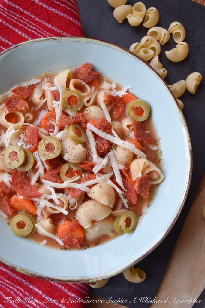 30-Minute Pepperoni Pizza Minestrone Soup - Everyone loves pizza for dinner, however, on a busy weeknight, it's nice to not have to worry about waiting for one to be delivered to your house. This quick 30-minute minestrone soup has all of the flavors of a pizza, using simple ingredients you have in your fridge and in your pantry. It's a fast, delicious, and flavorful weeknight meal, without the need for delivery. And, there are a few vegetables thrown in for extra nutrition.