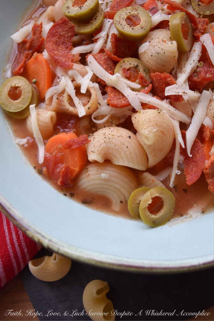 30-Minute Pepperoni Pizza Minestrone Soup - Everyone loves pizza for dinner, however, on a busy weeknight, it's nice to not have to worry about waiting for one to be delivered to your house. This quick 30-minute minestrone soup has all of the flavors of a pizza, using simple ingredients you have in your fridge and in your pantry. It's a fast, delicious, and flavorful weeknight meal, without the need for delivery. And, there are a few vegetables thrown in for extra nutrition.