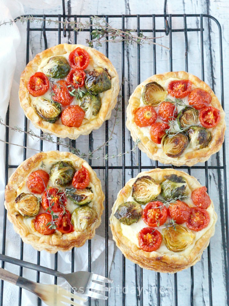 Brussels Sprouts Cherry Tomato Tart - Fiesta Friday - Welcome to Friday! Friday! Friday! Favorites! Each Friday we'll be sharing our favorite recipes of the week from other fabulous food bloggers, so make sure to visit and see what tasty over-the-top dishes we're most excited about.