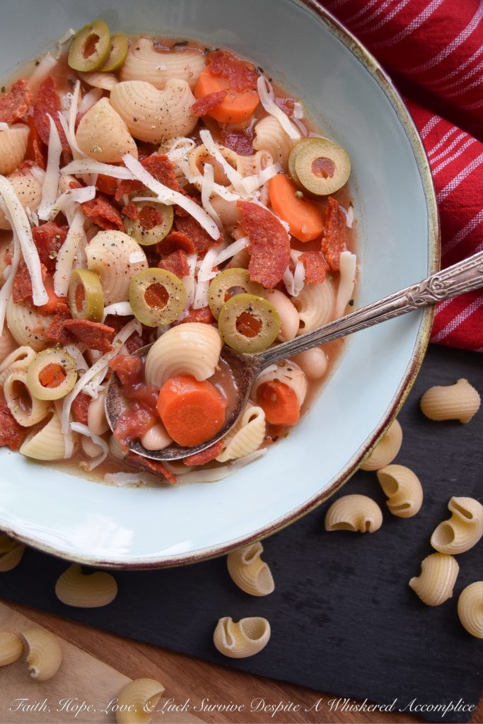 30-Minute Pepperoni Pizza Minestrone Soup - Everyone loves pizza for dinner, however, on a busy weeknight, it's nice to not have to worry about waiting for one to be delivered to your house. This quick 30-minute minestrone soup has all of the flavors of a pizza, using simple ingredients you have in your fridge and in your pantry. It's a fast, delicious, and flavorful weeknight meal, without the need for delivery. And, there are a few vegetables thrown in for extra nutrition.