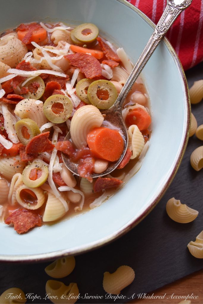 30-Minute Pepperoni Pizza Minestrone Soup - Everyone loves pizza for dinner, however, on a busy weeknight, it's nice to not have to worry about waiting for one to be delivered to your house. This quick 30-minute minestrone soup has all of the flavors of a pizza, using simple ingredients you have in your fridge and in your pantry. It's a fast, delicious, and flavorful weeknight meal, without the need for delivery. And, there are a few vegetables thrown in for extra nutrition.