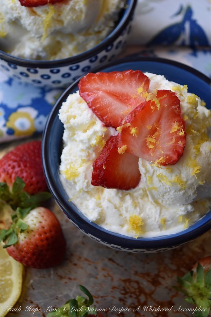 Lemon Cheesecake Ice Cream with Strawberries - You're just seven ingredients away from the best lemony cheesecake ice cream you've ever tasted. The secret? Fresh lemon juice and zest, heavy whipping cream, cream cheese, sugar, vanilla, and a touch of salt. And, to top things off, a few freshly sliced strawberries. Because every lemony dessert tastes just a little bit better with fresh fruit, am I right?