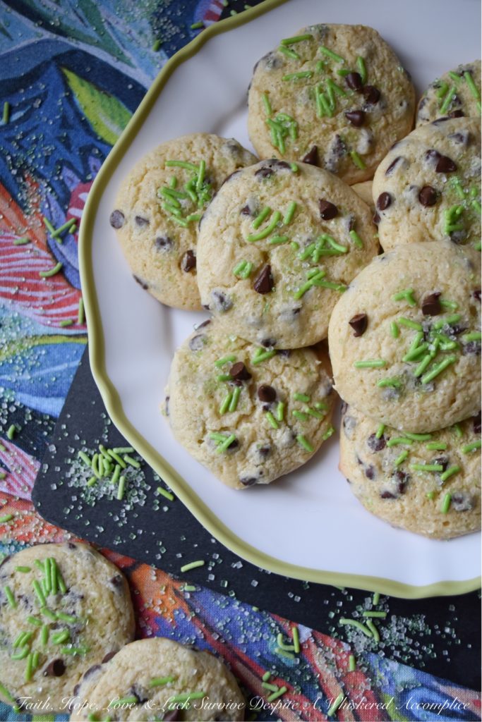 Baileys Cake Mix Chocolate Chip Cookies - Homemade cookies are only one boxed cake mix away, thanks to these chocolate chip cookies, made using Baileys Irish Cream and a few other simple ingredients. Trust me, you're definitely going to want to put a box of white cake mix and a bag of miniature semi-sweet chocolate chips on your grocery list before St. Patrick's Day.