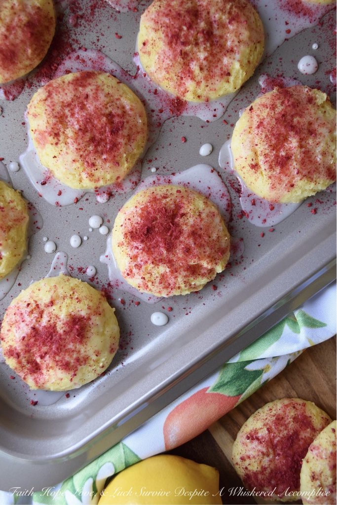 Lemon Raspberry Cake Mix Cookies - Never take a cake mix for granted. Not only are they easy to use, but you can make a myriad of other desserts with them, including these soft, moist, and lemony cake mix cookies. After being drizzled with a lemony glaze and dusted with dried raspberries, these delicious cookies are pretty much impossible to resist. Try them for yourself and see.