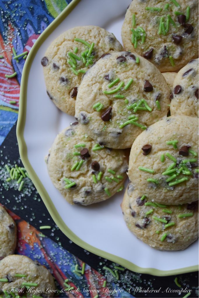 Baileys Cake Mix Chocolate Chip Cookies - Homemade cookies are only one boxed cake mix away, thanks to these chocolate chip cookies, made using Baileys Irish Cream and a few other simple ingredients. Trust me, you're definitely going to want to put a box of white cake mix and a bag of miniature semi-sweet chocolate chips on your grocery list before St. Patrick's Day.